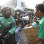 Grab Bagikan 125 Ribu Masker Untuk Mitra Pengemudi Dan Penumpang Di Jabodetabek